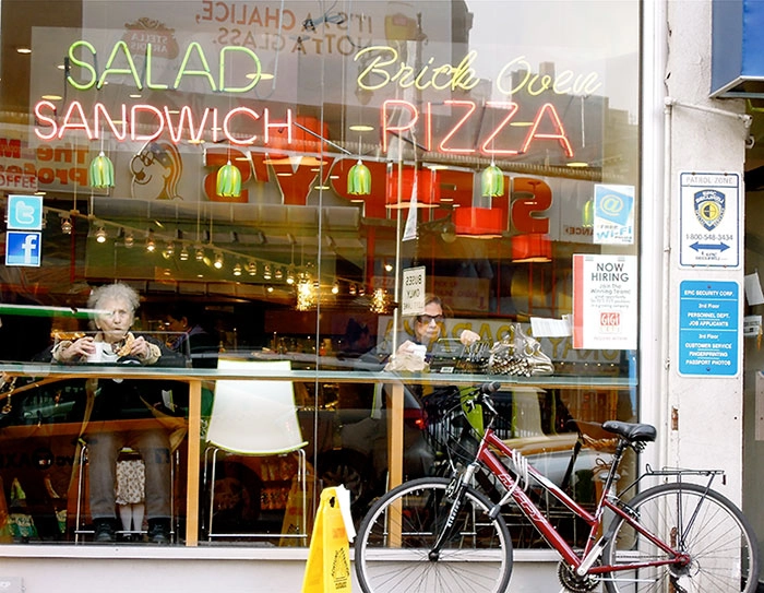 New York, a woman sitting in a cafe