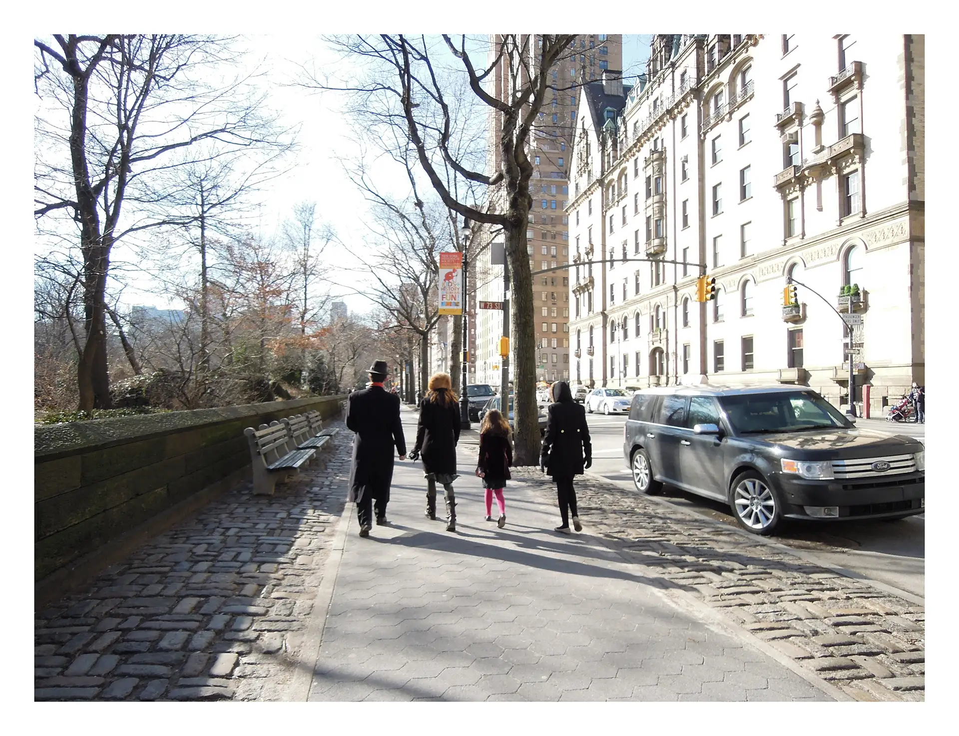 New York, four people walking along the street